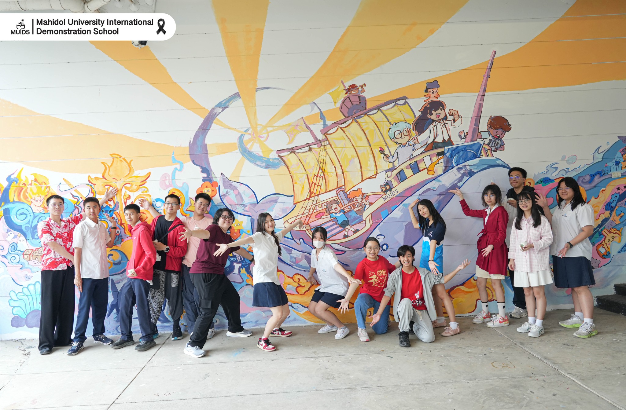 Students in front of the mural